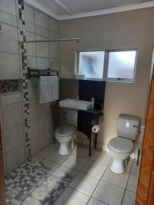 Koupelna v ubytování Wilreco self carting 2 bedroom flat. + 9 fotografií