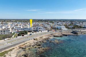 Φωτογραφία από το άλμπουμ του Camere arcobaleno vicino al mare a Torre san Giovanni σε Torre San Giovanni Ugento