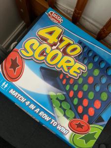 a box of games on a table at Winter Gardens Flat 2 - Studio in Blackpool