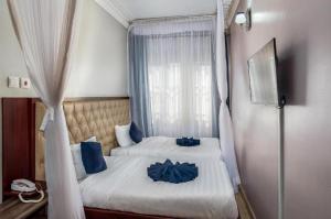 Keba Xpress Hotel - Entebbe客房内的一张或多张床位