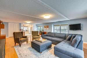 a living room with a couch and a tv at 7 Mi to Newark Montclair Vacation Rental in Montclair