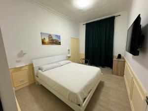 Postel nebo postele na pokoji v ubytování Costantino Rooms