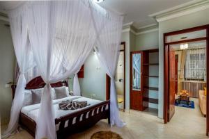 Keba Xpress Hotel - Entebbe客房内的一张或多张床位