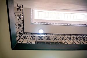 a window in a room with a tile floor at Hotel Du Parc in Poza Rica de Hidalgo