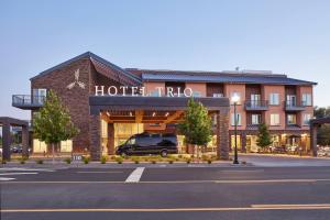 a hotel with a van parked in front of it at Hotel Trio Healdsburg in Healdsburg
