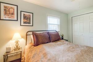 a bedroom with a bed and a window at Pet-Friendly Alexandria Escape with Yard 8 Mi to DC in Alexandria