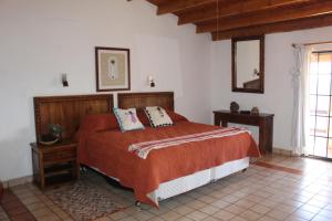 Rúm í herbergi á Hotel Divisadero Barrancas