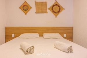 Ein Bett oder Betten in einem Zimmer der Unterkunft excluir-Apto agradável a 800m da praia de Patacho CVPA103