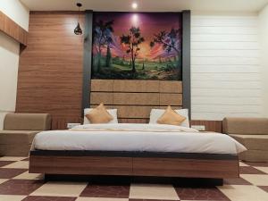 Hotel Anil Farmhouse Gir Jungle Resort客房内的一张或多张床位