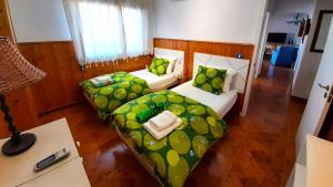 an overhead view of a bedroom with two beds at Puerto Santiago Plaza in Puerto de Santiago