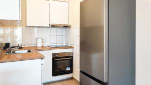 Η κουζίνα ή μικρή κουζίνα στο FilinHome Brankovica Suite