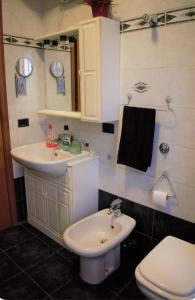 Koupelna v ubytování Appartamento dentro Roma
