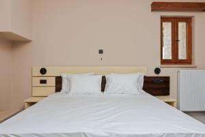 Ένα ή περισσότερα κρεβάτια σε δωμάτιο στο The View Hotel