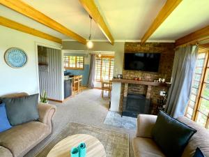 Posezení v ubytování The Hedge at Dullstroom Cottage