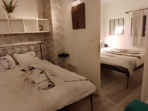 Postel nebo postele na pokoji v ubytování Maison dans une résidence de vacances
