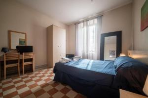 Postel nebo postele na pokoji v ubytování Reyes Suite & Rooms