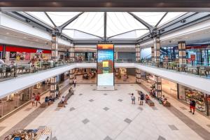 an overhead view of a shopping mall with people at Hotel Velis in Vélez-Málaga