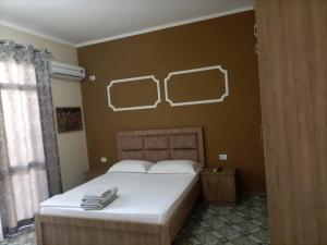Ένα ή περισσότερα κρεβάτια σε δωμάτιο στο Twins Villa Mangalem