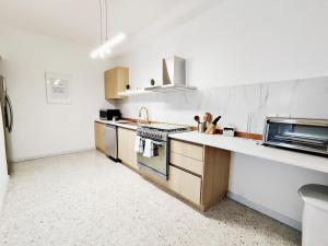 Η κουζίνα ή μικρή κουζίνα στο Laila MaiaHome - Exclusiva Casa de 3 Recámaras y 3.5 Baños Polanco +10 φωτογραφίες