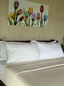 Letto o letti in una camera di The Serene House Bed & Breakfast