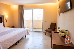 Nápoje v ubytování Hotel Balcón del Cielo