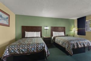 Ein Bett oder Betten in einem Zimmer der Unterkunft Americas Best Value Inn Edenton