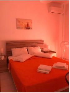 Ένα ή περισσότερα κρεβάτια σε δωμάτιο στο eleni apartments