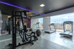 Fitness centrum a/nebo fitness zařízení v ubytování Paulista Suites by Charlie