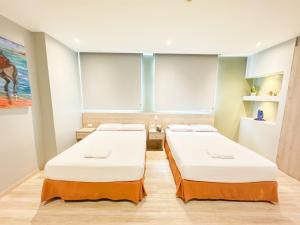 Voodi või voodid majutusasutuse GH Sander Hotel toas
