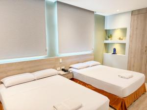 Voodi või voodid majutusasutuse GH Sander Hotel toas