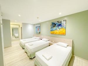 Voodi või voodid majutusasutuse GH Sander Hotel toas