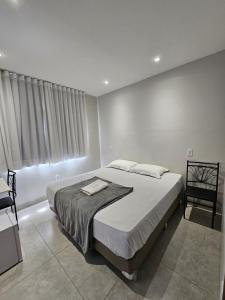 Ένα ή περισσότερα κρεβάτια σε δωμάτιο στο HOTEL POLASTRELLI +78 φωτογραφίες