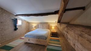 MontayralにあるDomaine des possibles - Equi Homeのベッドルーム1室(梁出し天井付) +16枚の写真