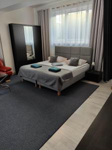 Postel nebo postele na pokoji v ubytování Villa Eleven