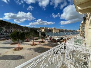 a view from the balcony of a building at Droplet in Kalkara