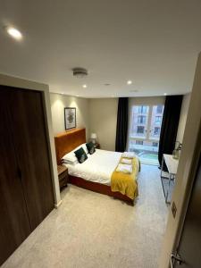 Cama ou camas em um quarto em Luxury City Centre Apartment