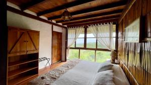 Łóżko lub łóżka w pokoju w obiekcie Samai Lodge Holistic Living