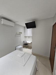 Ένα ή περισσότερα κρεβάτια σε δωμάτιο στο HOTEL POLASTRELLI