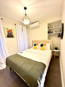 Katil atau katil-katil dalam bilik di Ultimate NYC Experience 3 bedroom with Game +8 gambar