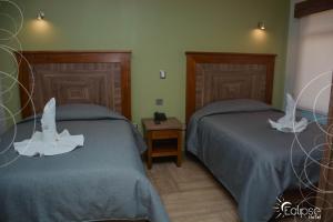 Letto o letti in una camera di HOTEL ECLIPSE TOLUCA