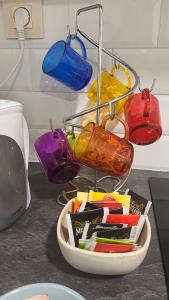a group of different colored lights on a counter at La de Fredyy - Tres Marias Apartments in Redondela