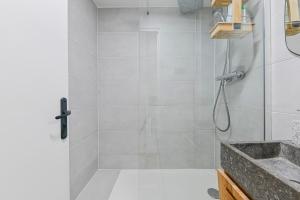 a bathroom with a shower and a sink at PANTHEON in Paris +14 photos