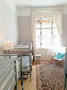 Postel nebo postele na pokoji v ubytování Bridgetown Hostel