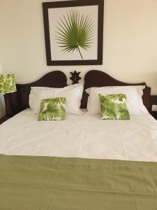 Postel nebo postele na pokoji v ubytování Studio vue mer - village de vacances - Sainte Anne