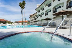 a swimming pool in front of a hotel at Santa Ynez Valley Marriott in Buellton