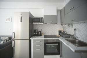 Kuchyň nebo kuchyňský kout v ubytování Ble Property Atlas