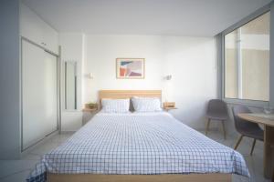 Postel nebo postele na pokoji v ubytování Ble Property Atlas