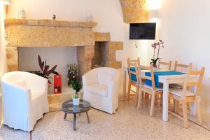 Posezení v ubytování Holiday home La Corte dei Pirri