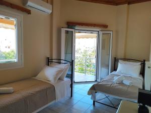 Postel nebo postele na pokoji v ubytování Sea View House