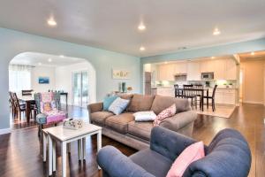 a living room with a couch and a table at Walk To Disneyland, Watch Firework Front Yard, SPA in Anaheim